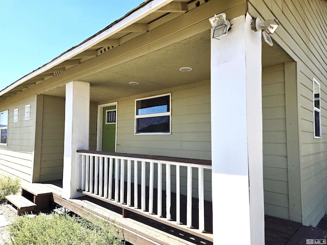 doorway to property with a porch