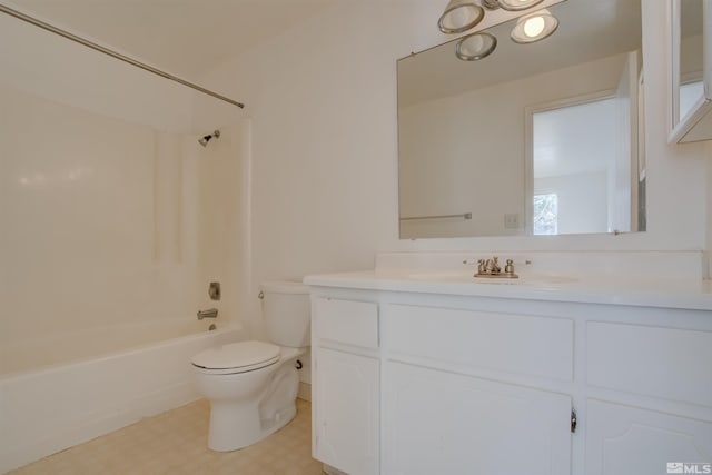 full bathroom featuring tub / shower combination, vanity, and toilet