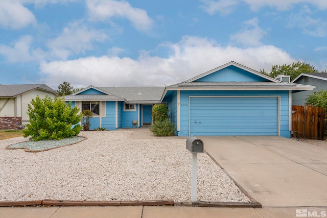 single story home featuring a garage