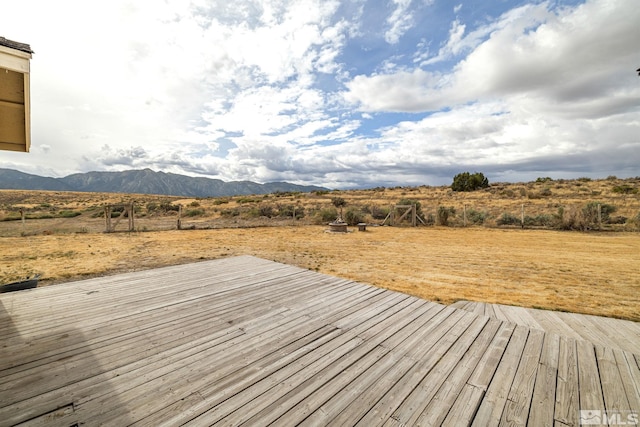 wooden terrace with a mountain view