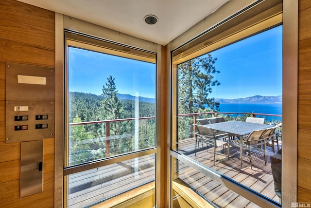 balcony with a water and mountain view