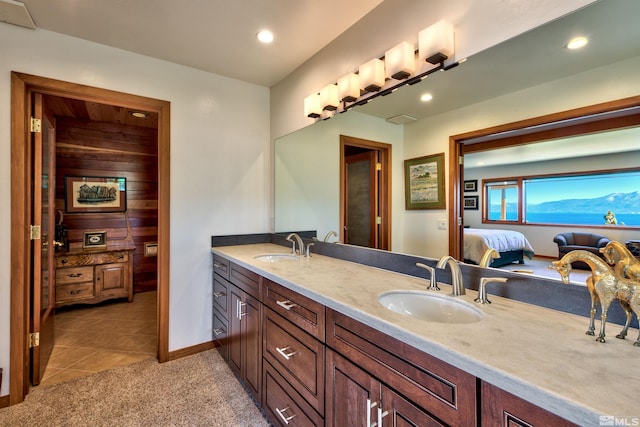 bathroom with vanity and tile patterned flooring