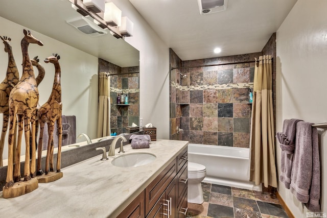 full bathroom featuring vanity, toilet, and shower / tub combo with curtain