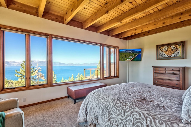 bedroom with light carpet, beam ceiling, and wooden ceiling