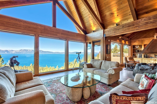 tiled living room featuring high vaulted ceiling, beam ceiling, a water and mountain view, and wooden ceiling