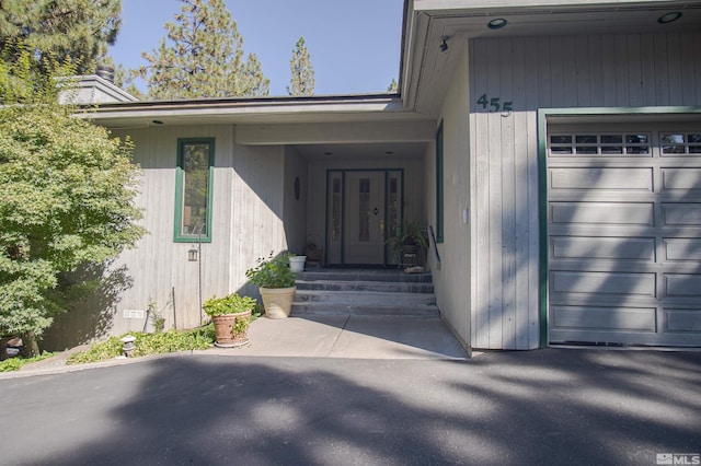 entrance to property with a garage