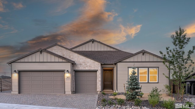 view of front of property with a garage