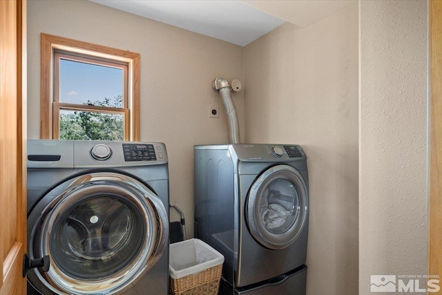 laundry area featuring washer and dryer