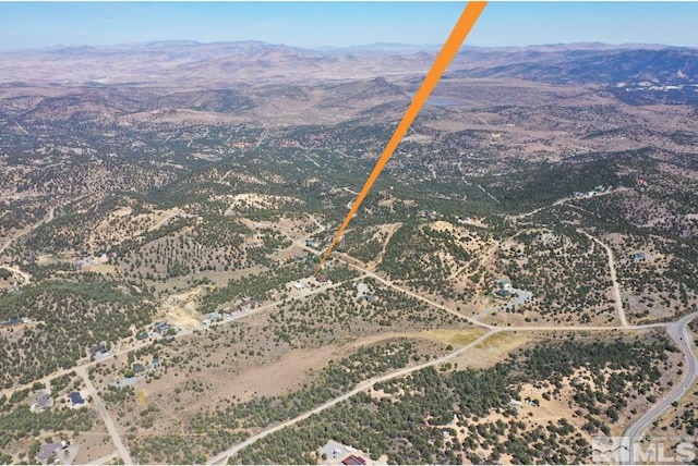 bird's eye view with a mountain view