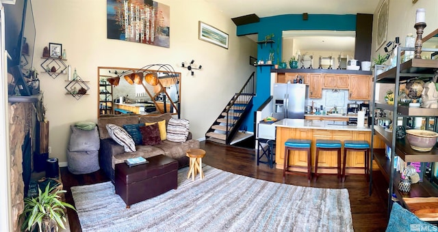 living room featuring dark wood-type flooring