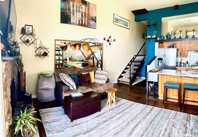 living room with dark hardwood / wood-style floors