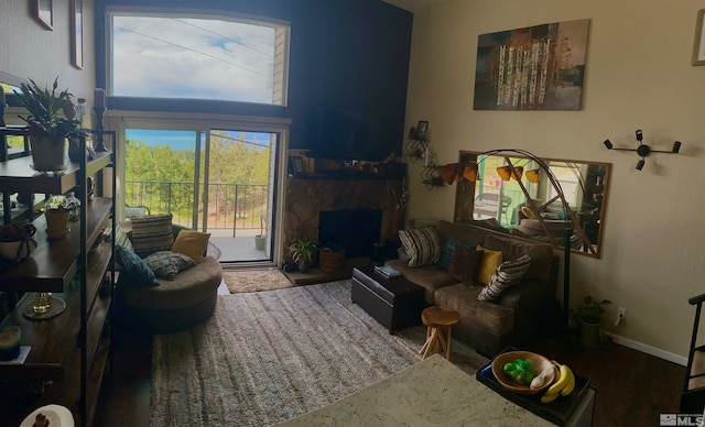 living room featuring a fireplace