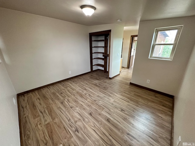 empty room with light wood-type flooring