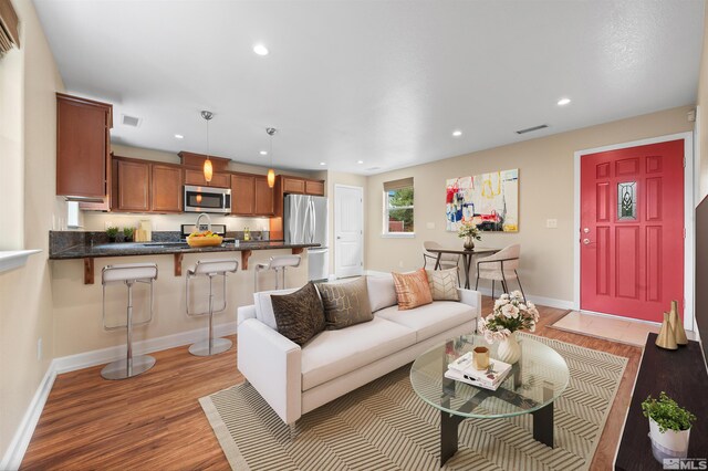 living room featuring hardwood / wood-style floors