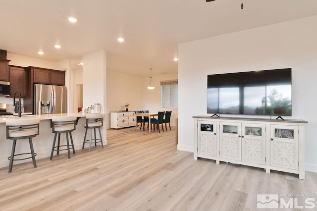 living room featuring light wood-type flooring