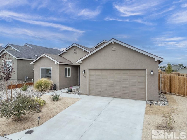 ranch-style home featuring a garage