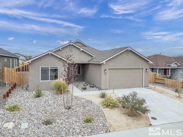 ranch-style house featuring a garage