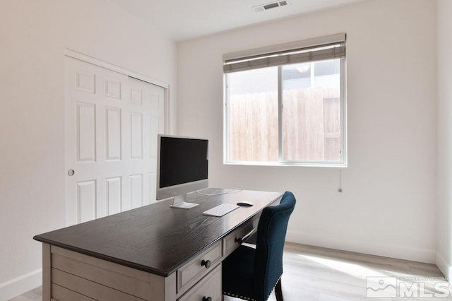 office featuring light hardwood / wood-style flooring