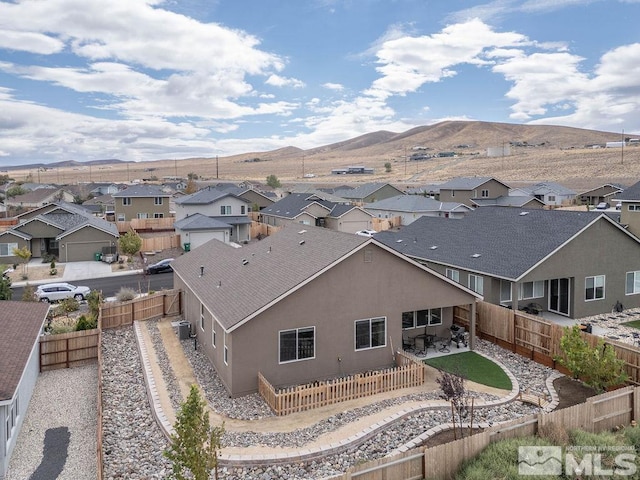 bird's eye view with a mountain view