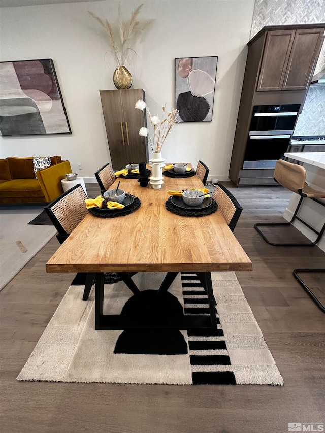 dining room featuring dark hardwood / wood-style floors