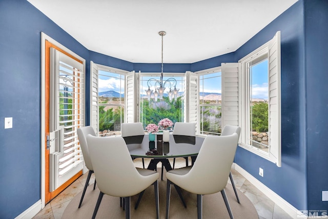 dining room featuring a chandelier