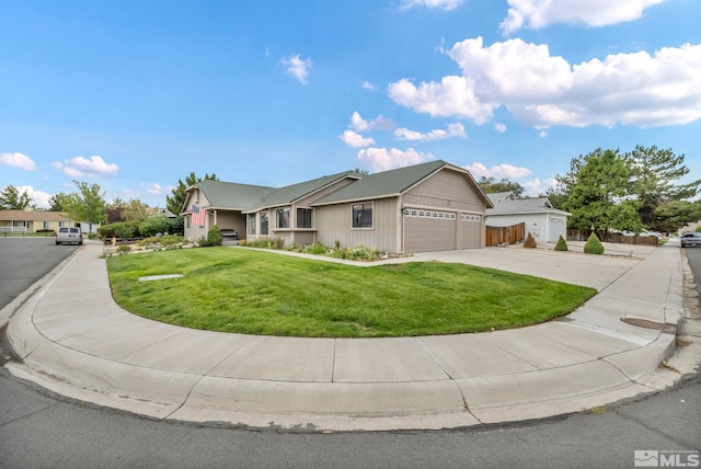 single story home with a front yard and a garage