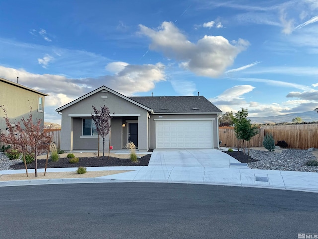 ranch-style house featuring a garage