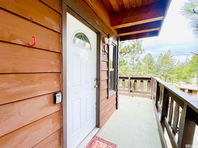 doorway to property with a balcony