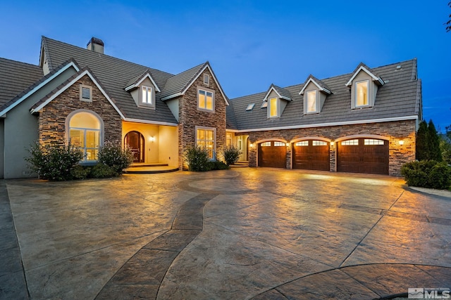 view of front of house with a garage