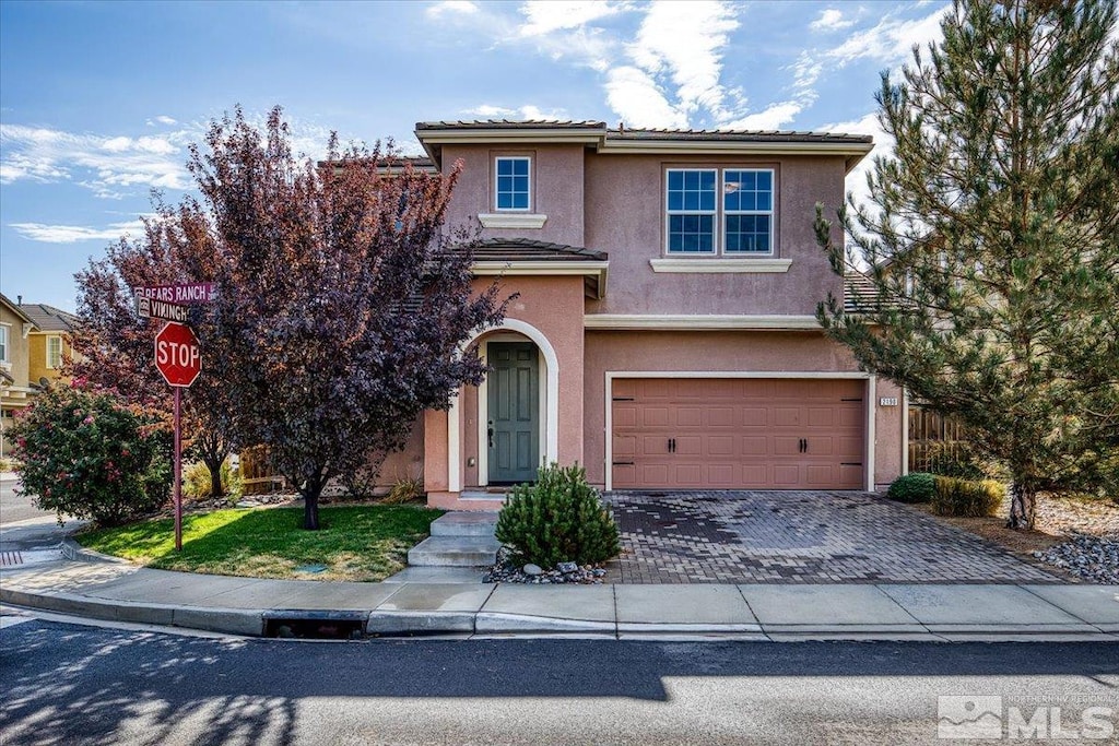 view of property featuring a garage