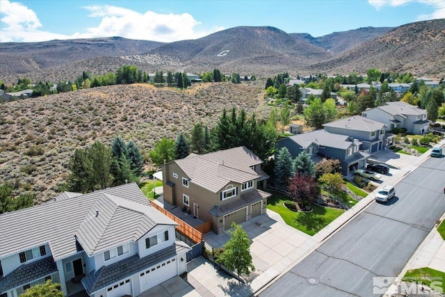 bird's eye view with a mountain view