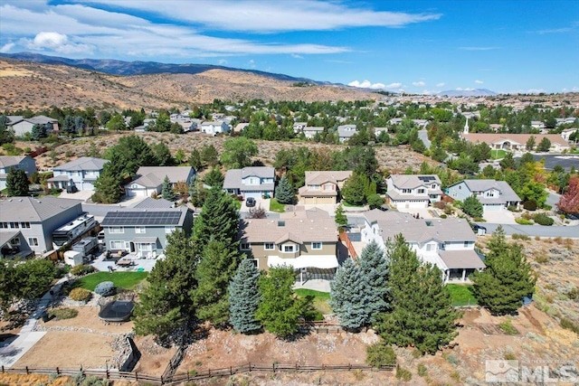 drone / aerial view featuring a mountain view