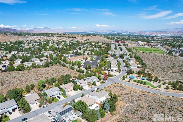 bird's eye view with a mountain view