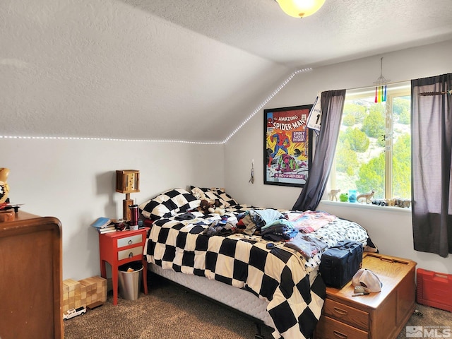 bedroom featuring a textured ceiling, carpet, and vaulted ceiling