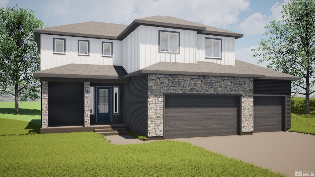 view of front facade featuring a front yard and a garage