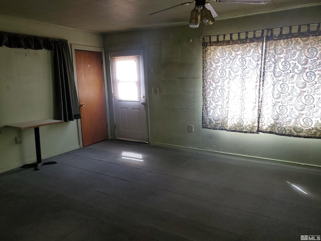 spare room featuring ceiling fan