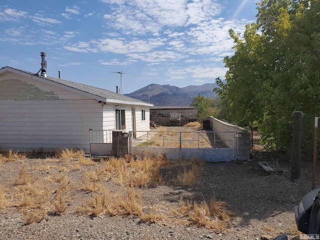 exterior space featuring a mountain view