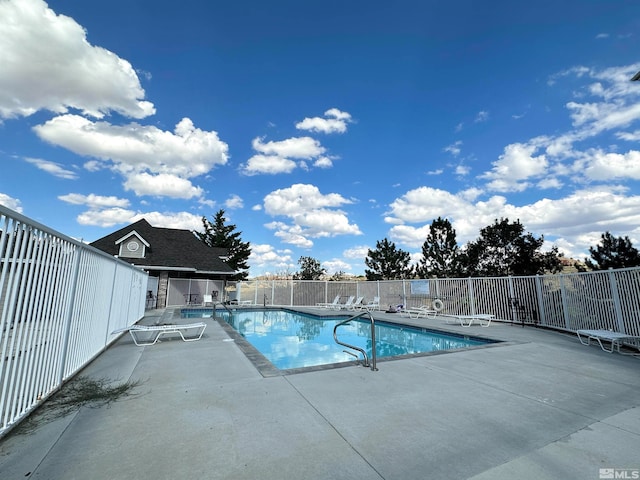 view of pool featuring a patio area