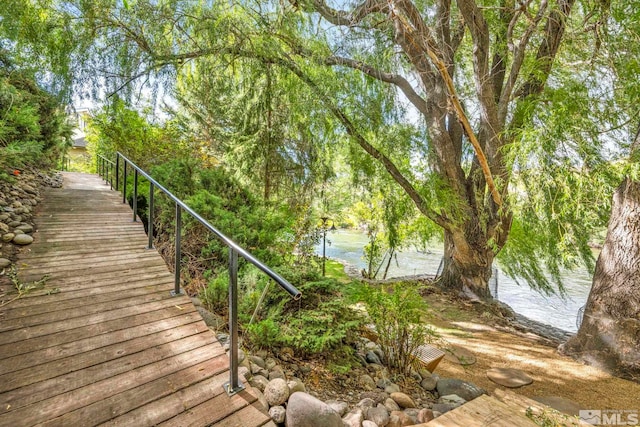 dock area featuring a water view