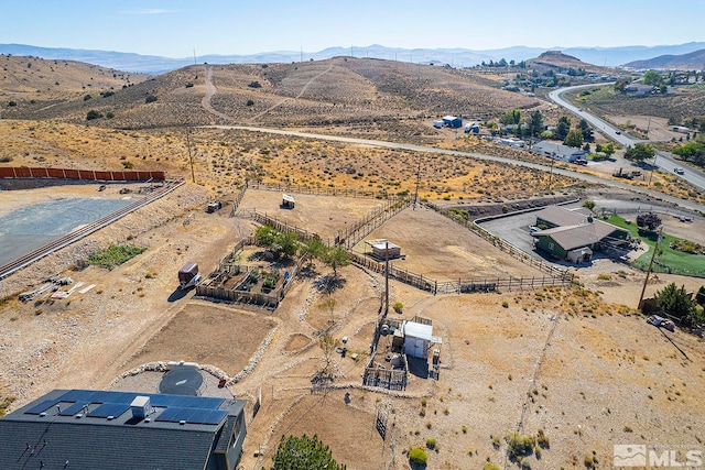 bird's eye view with a mountain view