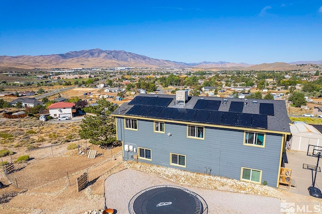 drone / aerial view with a mountain view