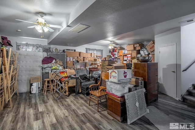 interior space featuring ceiling fan