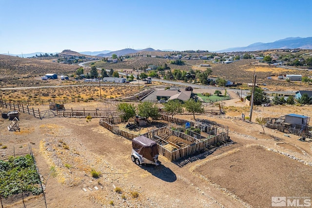 bird's eye view with a rural view and a mountain view