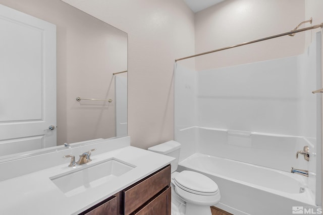 full bathroom with vanity, shower / bath combination, and toilet