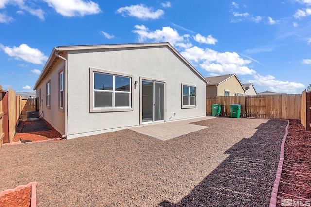 rear view of house featuring a patio