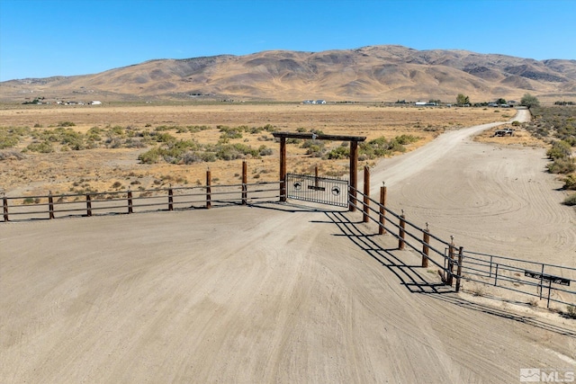 property view of mountains with a rural view