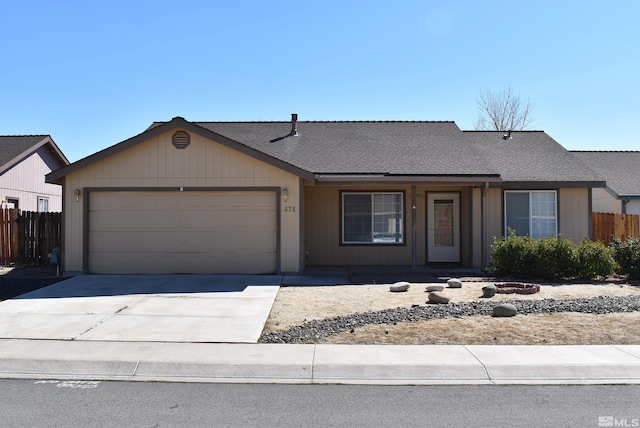 ranch-style home featuring a garage