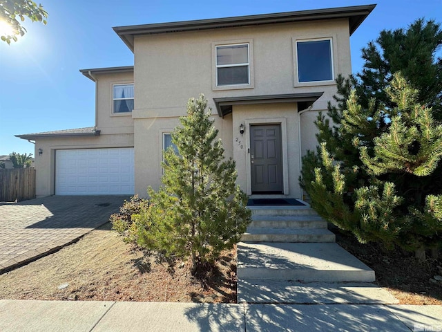 view of front of property with a garage