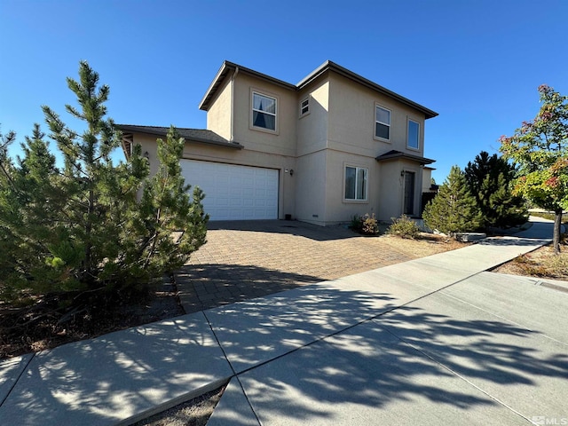 front of property featuring a garage