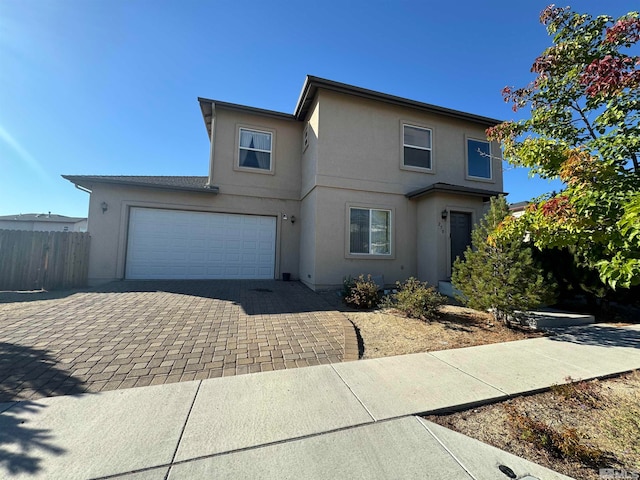 front of property with a garage